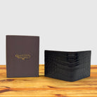 Dark Brown wallet with box at wooden surface