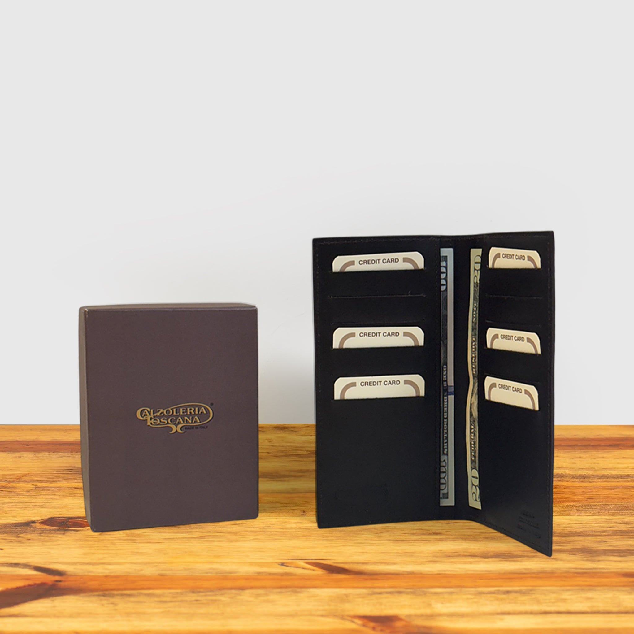 Dark Brown crocodile-patterned wallet with credit cards and box on a wooden surface
