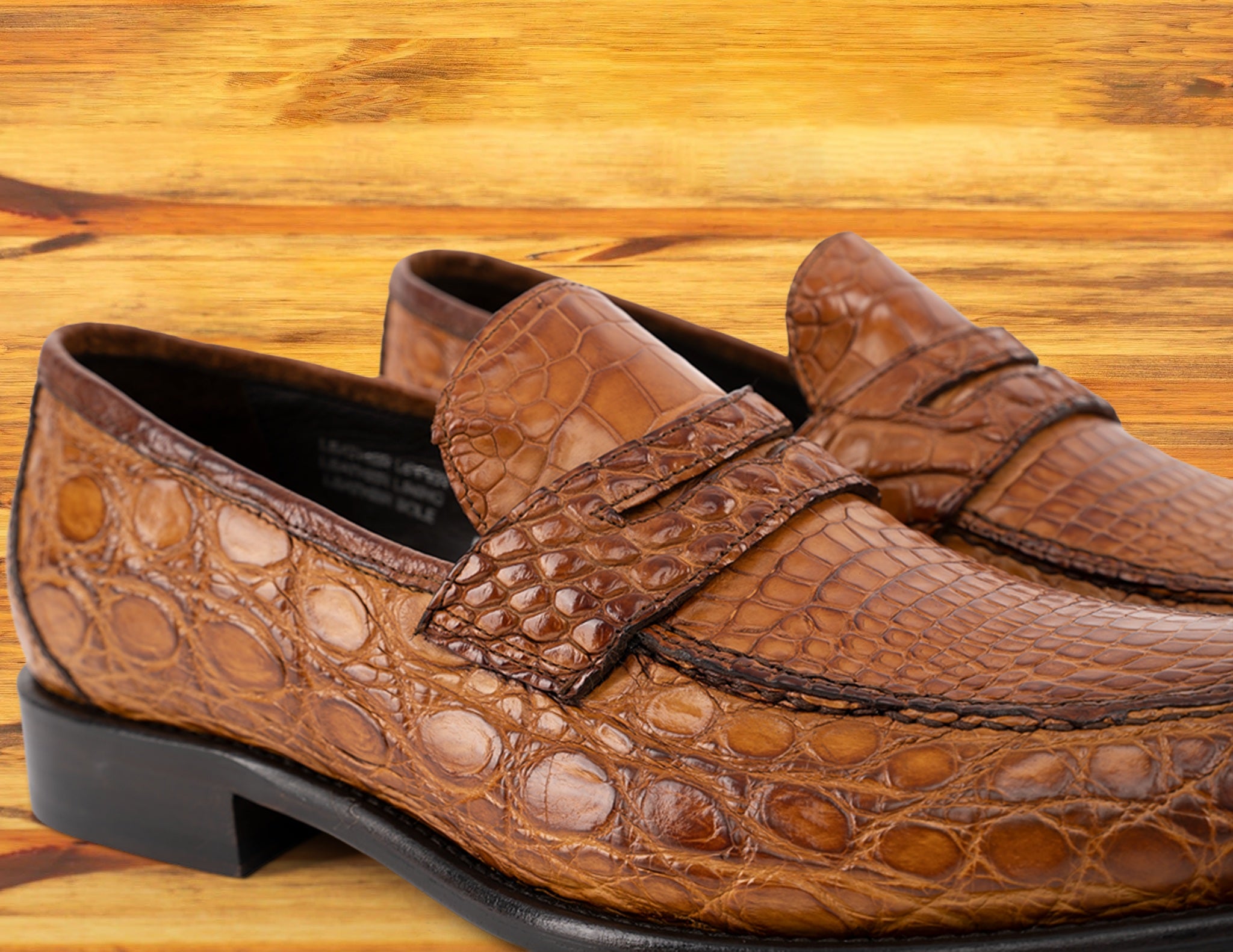 Brick leather loafer on a wooden surface 