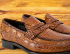 Brick leather loafer on a wooden surface 