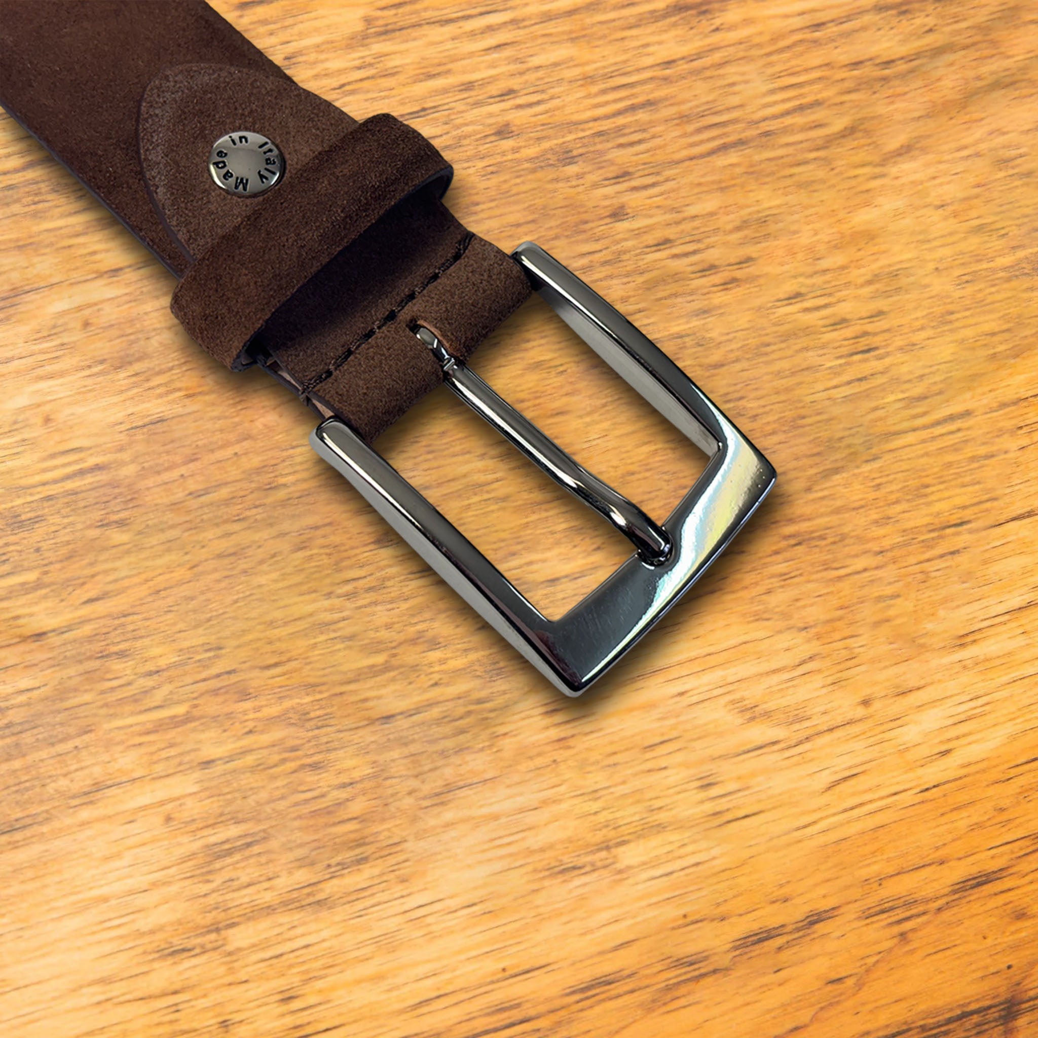 Brick belt buckle on a wooden surface