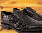 Brown crocodile shoe on a wooden surface