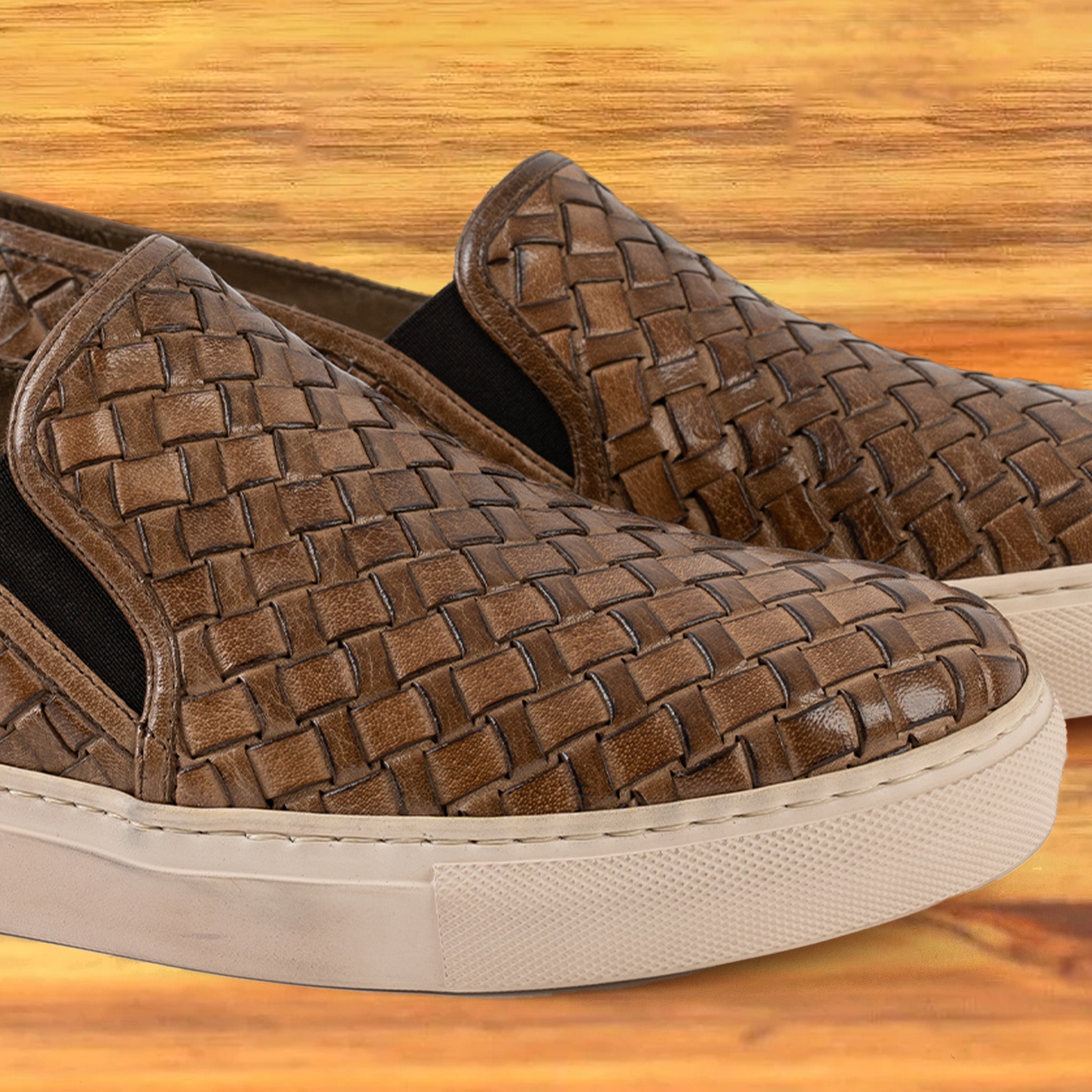Moor woven slip-on shoe on a wooden surface